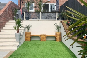 Securing artificial grass